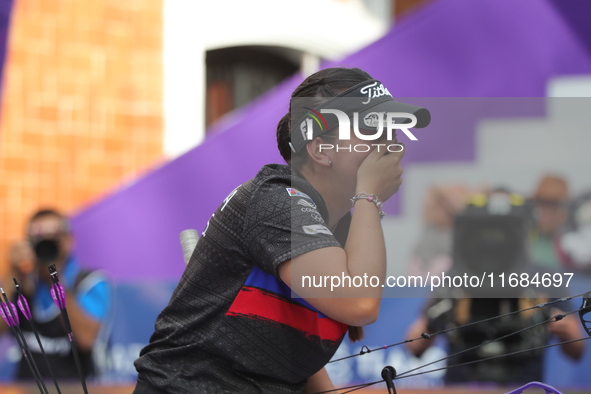 Sara Lopez of Colombia competes against Meeri-Marita Paas of Estonia (not in picture) during the women's compound gold medal match on the se...