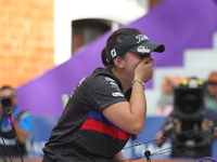 Sara Lopez of Colombia competes against Meeri-Marita Paas of Estonia (not in picture) during the women's compound gold medal match on the se...