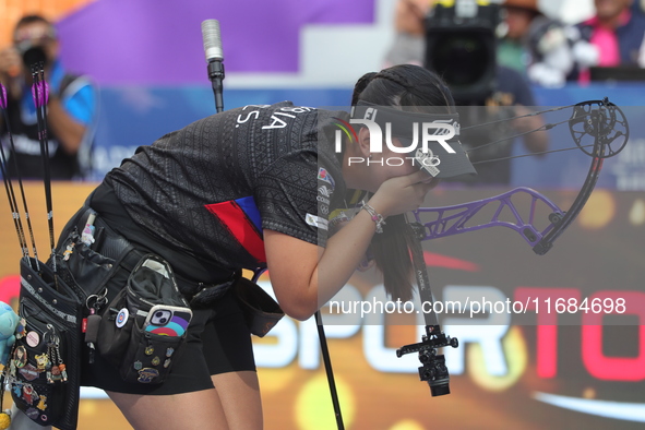 Sara Lopez of Colombia competes against Meeri-Marita Paas of Estonia (not in picture) during the women's compound gold medal match on the se...