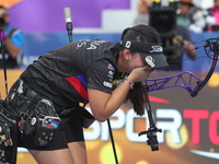 Sara Lopez of Colombia competes against Meeri-Marita Paas of Estonia (not in picture) during the women's compound gold medal match on the se...