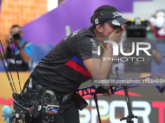 Sara Lopez of Colombia competes against Meeri-Marita Paas of Estonia (not in picture) during the women's compound gold medal match on the se...