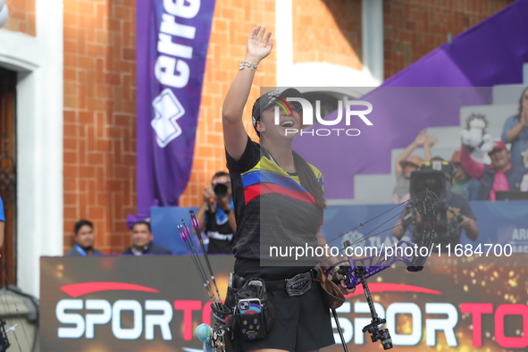 Sara Lopez of Colombia competes against Meeri-Marita Paas of Estonia (not in picture) during the women's compound gold medal match on the se...