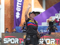 Sara Lopez of Colombia competes against Meeri-Marita Paas of Estonia (not in picture) during the women's compound gold medal match on the se...