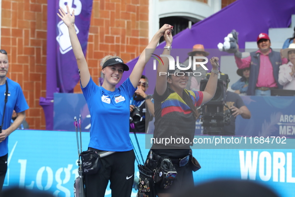 Meeri-Marita Paas of Estonia and Sara Lopez of Colombia compete during the women's compound gold medal match on the second day of the Tlaxca...