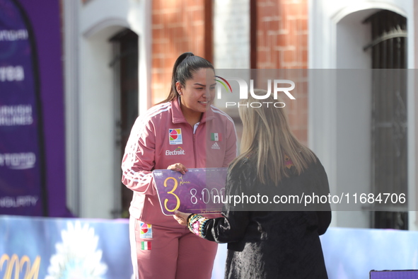 Bronze medalist Dafne Quintero of Mexico participates in the medal ceremony on the second day of the Tlaxcala 2024 Archery World Cup Final i...