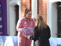 Bronze medalist Dafne Quintero of Mexico participates in the medal ceremony on the second day of the Tlaxcala 2024 Archery World Cup Final i...