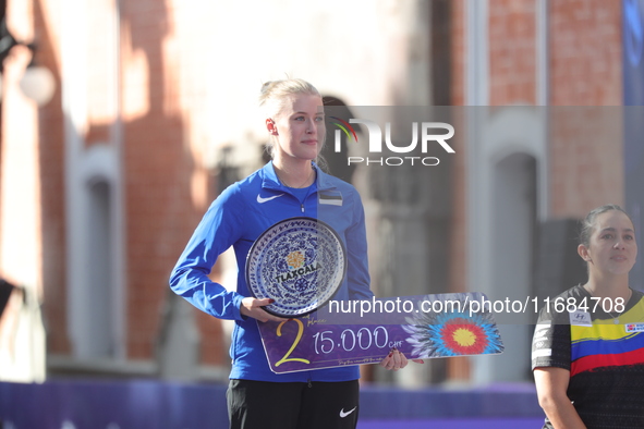 Silver medalist Meeri-Marita Paas of Estonia participates in the medal ceremony on the second day of the Tlaxcala 2024 Archery World Cup Fin...