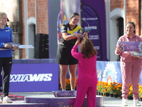 (L-R) Silver medalist Meeri-Marita Paas of Estonia, gold medalist Sara Lopez of Colombia, and bronze medalist Dafne Quintero of Mexico parti...