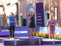 (L-R) Silver medalist Meeri-Marita Paas of Estonia, gold medalist Sara Lopez of Colombia, and bronze medalist Dafne Quintero of Mexico parti...