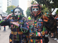 People in disguise take part in the annual Zombie Walk 2024 from the Monument to the Revolution to the main square Zocalo in Mexico City, Me...