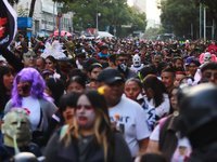 People in disguise take part in the annual Zombie Walk 2024 from the Monument to the Revolution to the main square Zocalo in Mexico City, Me...