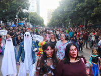 People in disguise take part in the annual Zombie Walk 2024 from the Monument to the Revolution to the main square Zocalo in Mexico City, Me...