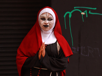 A person disguised as a nun takes part in the annual Zombie walk 2024 Mx, from the Monument to the Revolution to the main square Zocalo in M...