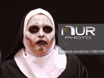 A person disguised as a nun takes part in the annual Zombie walk 2024 Mx, from the Monument to the Revolution to the main square Zocalo in M...