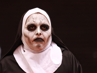 A person disguised as a nun takes part in the annual Zombie walk 2024 Mx, from the Monument to the Revolution to the main square Zocalo in M...