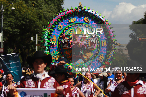 A person participates in the 16th edition of the traditional Monumental Alebrijes parade organized by the Museum of Popular Art (MAP). The p...