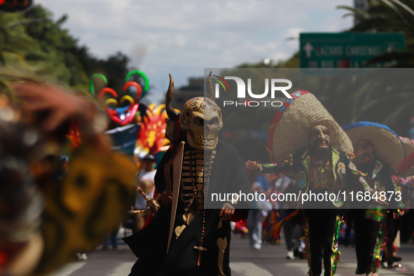 A person participates in the 16th edition of the traditional Monumental Alebrijes parade organized by the Museum of Popular Art (MAP). The p...