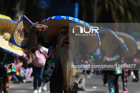 A person participates in the 16th edition of the traditional Monumental Alebrijes parade organized by the Museum of Popular Art (MAP). The p...