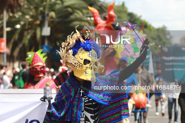 A person participates in the 16th edition of the traditional Monumental Alebrijes parade organized by the Museum of Popular Art (MAP). The p...