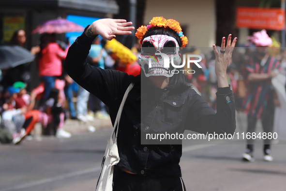 A person participates in the 16th edition of the traditional Monumental Alebrijes parade organized by the Museum of Popular Art (MAP). The p...