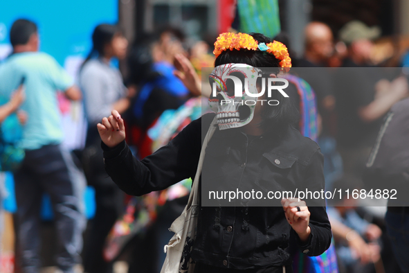 A person participates in the 16th edition of the traditional Monumental Alebrijes parade organized by the Museum of Popular Art (MAP). The p...