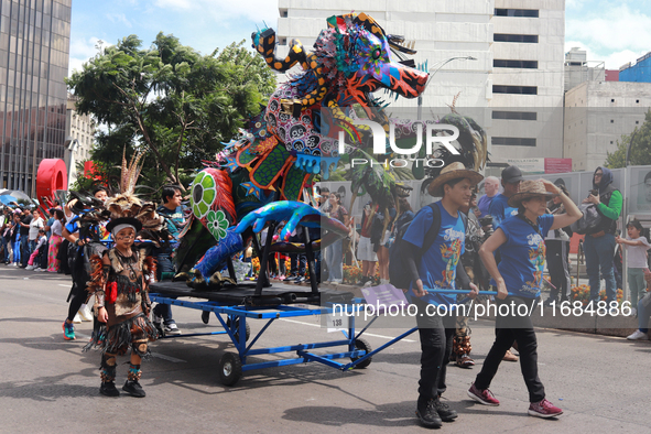 A person participates in the 16th edition of the traditional Monumental Alebrijes parade organized by the Museum of Popular Art (MAP). The p...