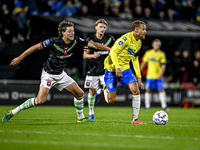 FC Twente forward Sam Lammers and RKC defender Liam van Gelderen play during the match between RKC and Twente at the Mandemakers Stadium in...