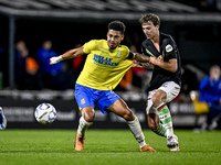 RKC forward Richonell Margaret and FC Twente midfielder Youri Regeer play during the match RKC - Twente at the Mandemakers Stadium in Waalwi...