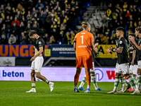 FC Twente forward Ricky van Wolfswinkel is in tears after the minute of silence for his father-in-law Johan Neeskens during the match betwee...