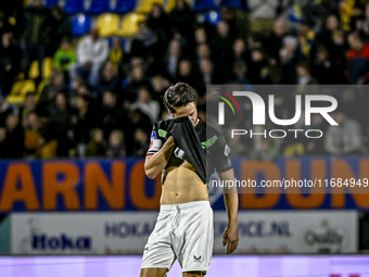 FC Twente forward Ricky van Wolfswinkel is in tears after the minute of silence for his father-in-law Johan Neeskens during the match betwee...