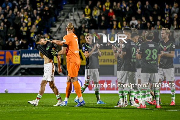 FC Twente forward Ricky van Wolfswinkel is in tears after the minute of silence for his father-in-law Johan Neeskens during the match betwee...