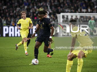 Juventus midfielder Khephren Thuram (19) fights for the ball against Lazio defender Nuno Tavares (30) during the Serie A football match numb...