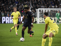 Juventus midfielder Khephren Thuram (19) fights for the ball against Lazio defender Nuno Tavares (30) during the Serie A football match numb...