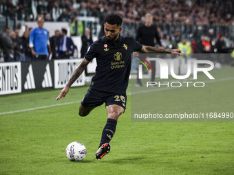 Juventus midfielder Douglas Luiz (26) shoots the ball during the Serie A football match number 8, Juventus versus Lazio, at the Allianz Stad...