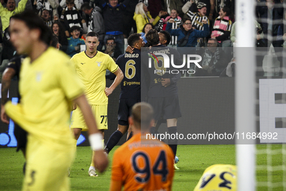 Juventus forward Dusan Vlahovic (9) and Juventus defender Danilo (6) celebrate after scoring the goal to make it 1-0 during the Serie A foot...