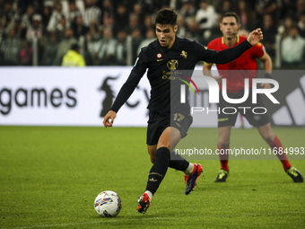 Juventus midfielder Vasilije Adzic (17) shoots the ball during the Serie A football match number 8, Juventus versus Lazio, at the Allianz St...