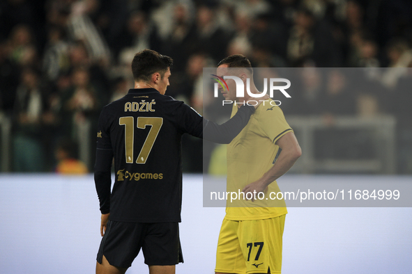 Juventus midfielder Vasilije Adzic (17) talks with Lazio defender Adam Marusic (77) after the Serie A football match number 8, Juventus vers...