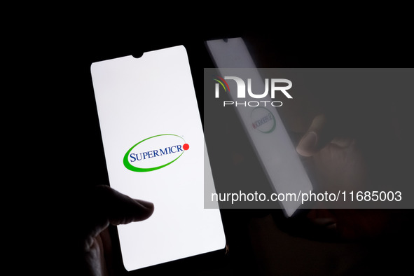 The Supermicro logo displays on a smartphone screen in Athens, Greece, on October 20, 2024. 