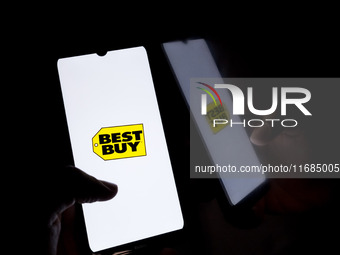 The Best Buy logo displays on a smartphone screen in Athens, Greece, on October 20, 2024. (