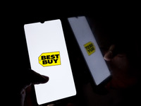 The Best Buy logo displays on a smartphone screen in Athens, Greece, on October 20, 2024. (