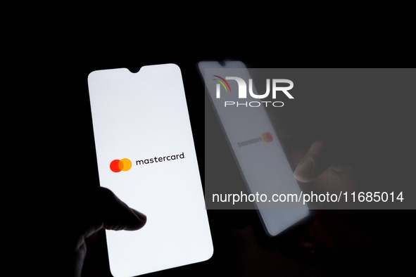 The Mastercard logo displays on a smartphone screen in Athens, Greece, on October 20, 2024. 