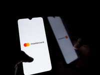 The Mastercard logo displays on a smartphone screen in Athens, Greece, on October 20, 2024. (