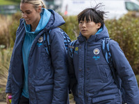 Jill Roord #10 of Manchester City W.F.C. and Aoba Fujino #20 of Manchester City W.F.C. arrive at the Joie Stadium during the Barclays FA Wom...