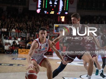 Matteo Librizzi of Openjobmetis Varese and Tibor Pleiss of Trapani Shark participate in the LBA Italy Championship match between Openjobmeti...