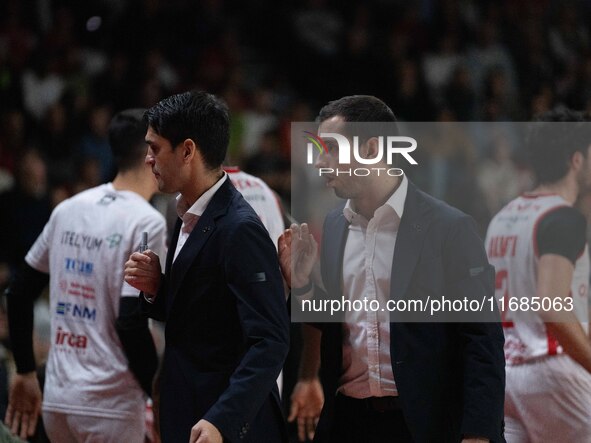 Head Coach Herman Mandole of Openjobmetis Varese and Marco Legovich participate in the LBA Italy Championship match between Openjobmetis Var...