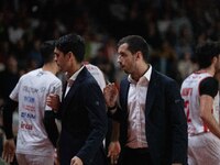 Head Coach Herman Mandole of Openjobmetis Varese and Marco Legovich participate in the LBA Italy Championship match between Openjobmetis Var...