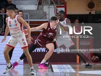 Amar Alibegovic of Trapani Shark and Gabe Brown of Openjobmetis Varese compete during the LBA Italy Championship match between Openjobmetis...