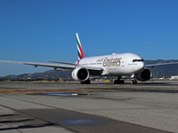 A Boeing 777-21H(LR) of Emirates begins the run for takeoff at Barcelona El Prat Airport in Barcelona, Spain, on October 8, 2024. (