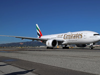 A Boeing 777-21H(LR) of Emirates begins the run for takeoff at Barcelona El Prat Airport in Barcelona, Spain, on October 8, 2024. (