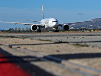 A Boeing 777-21H(LR) of Emirates begins the run for takeoff at Barcelona El Prat Airport in Barcelona, Spain, on October 8, 2024. (